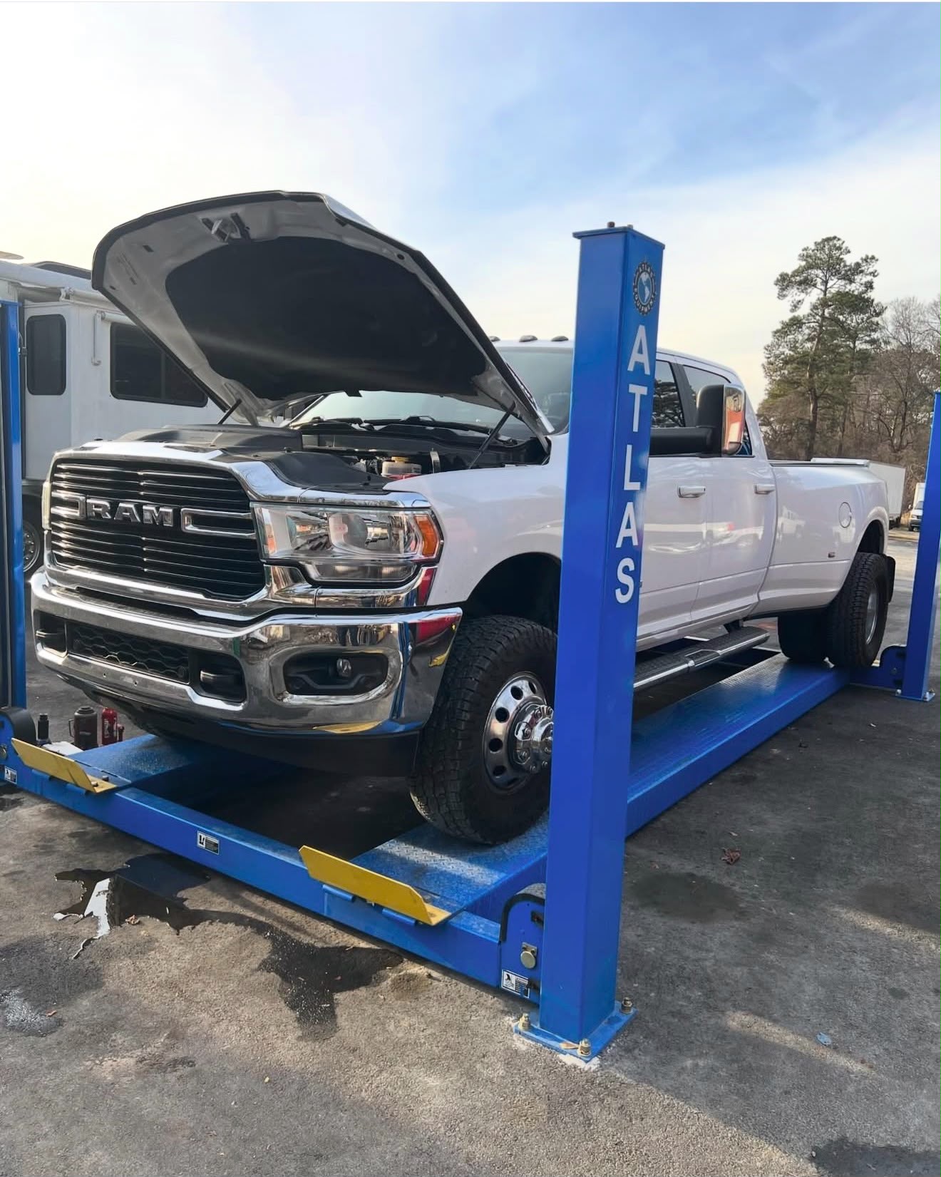 Ram diesel pickup on lift for service